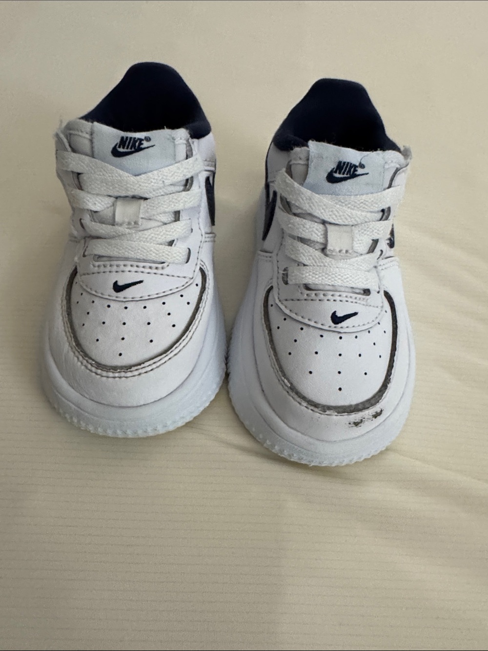 Nike Kids White and Navy Low-Top Sneakers with Swoosh